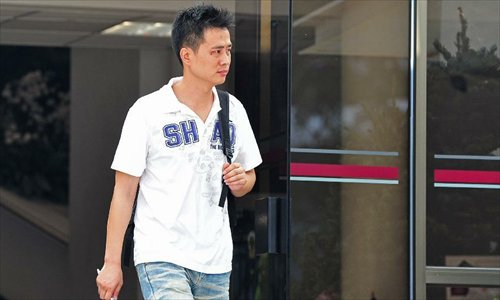 Chinese bus driver Gao Yueqiang attends court proceedings held at Subordinate Court in Singapore, December 12, 2012. Four Chinese bus drivers charged with instigating illegal strike attended a court hearing in Singapore Wednesday. A total of 171 Chinese bus drivers took medical leave on November 26 in protest against inequitable pay rises by local public transport operator SMRT, and 88 of them stayed away from work the following day. Five drivers were arrested and charged, while 29 others had their work permits revoked and deported to China. Out of the arrested, Bao Fengshan was sentenced to six weeks in jail, and the remaining four charged with instigating an illegal strike were released on bail. Photo: Xinhua
