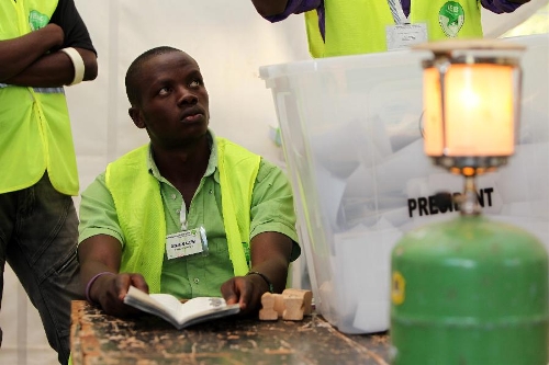 A staff worker holds ballot papers with hands at a counting station in Nairobi, Kenya, March 4, 2013. Millions of Kenyans turned up early Monday to vote in the historic general elections after independence and in the first national exercise under new constitution after the a disputed polls in 2007. According to the constitution, Kenya's Independent Electoral and Boundaries Commission (IEBC) will have seven days to officially announce the results, but the country's next president is expected to be known by Monday evening or Tuesday. (Xinhua/Meng Chenguang) Related:Kenya's electoral body extends voting timeNAIROBI, March 4 (Xinhua) -- Kenya's electoral body extended voting on Monday in areas where there were still long queues by the end of the official closing time at 17:00 hrs.The Independent Electoral and Boundary Commission (IEBC) CEO James Oswago however assured voters in affected areas and those who are still on queue that they will be accorded ample time to enable them to exercise their democratic rights. Full story