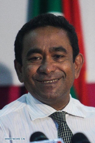 Abdulla Yameen, the candidate for the Progressive Party of Maldives, attends a press conference in Male, capital of the Maldives, Nov. 16, 2013. - e9f78062-c4d2-4b27-ae43-bc619c66a7a7