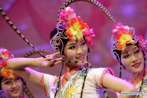 Chinese actresses perform during the 