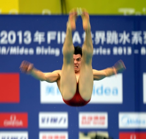 Yahel Castillo of Mexico competes during the men's 3m springboard semifinal B at the FINA Diving World Series 2013 held at the Aquatics Center, in Beijing, capital of China, on March 16, 2013. Yahel Castillo enter the final with 423.40 points. (Xinhua/Guo Yong) 