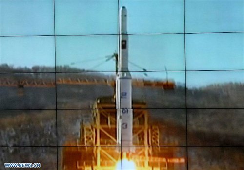 Photo released by the official KCNA news agency of the Democratic People's Republic of Korea (DPRK) on Dec. 12, 2012 shows the Unha-3 carrier rocket launching with the satellite Kwangmyongsong-3, on a monitor screen at the satellite control center. According to the KCNA, the second version of Kwangmyongsong-3 was launched by an Unha-3 carrier rocket at 9:49 a.m. local time (0049 GMT) Wednesday from the Sohae Space Center in Cholsan County, North Phyongan Province, and entered the preset orbit. Photo: Xinhua