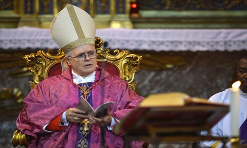 Brazilian Cardinal Odilo Pedro Scherer leads a mass at the Church of St. Andrews at the Quirinal in Rome on Sunday. As the Vatican prepares to elect a new pope, eyes have focused on Scherer, a moderate conservative tipped as Latin America's top contender. Photo: AFP 