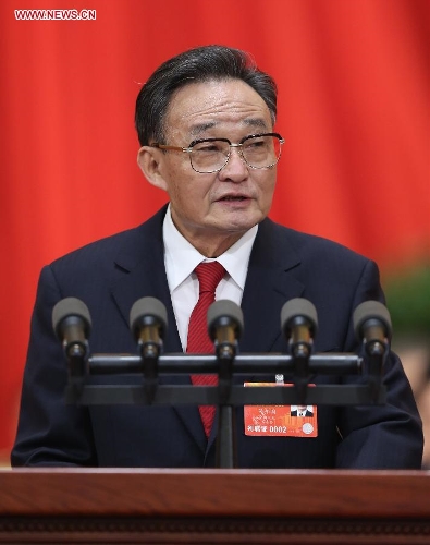 Wu Bangguo delivers a work report of the Standing Committee of the National People's Congress (NPC) during the second plenary meeting of the first session of the 12th NPC at the Great Hall of the People in Beijing, capital of China, March 8, 2013. (Xinhua/Pang Xinglei) 