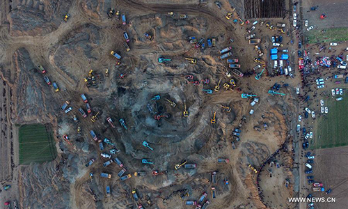 Image result for Chinese rescuers race to reach boy trapped in dried well in Hebei