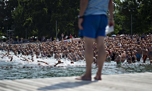 People Participate In Traditional Lake Zurich Crossing Swimmin