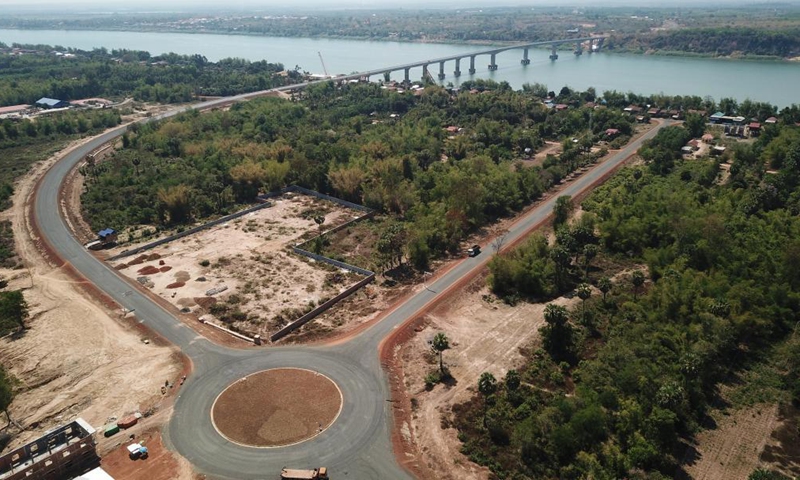 Aerial photo taken on March 11, 2021 shows the eighth Cambodia-China Friendship Bridge across the Mekong River, connecting Kampong Cham province and Tboung Khmum province in southeastern Cambodia. Construction work on the eighth Cambodia-China Friendship Bridge was completed earlier than schedule despite the COVID-19 pandemic, Cambodian Minister of Public Works and Transport Sun Chanthol said on Tuesday.Photo:Xinhua