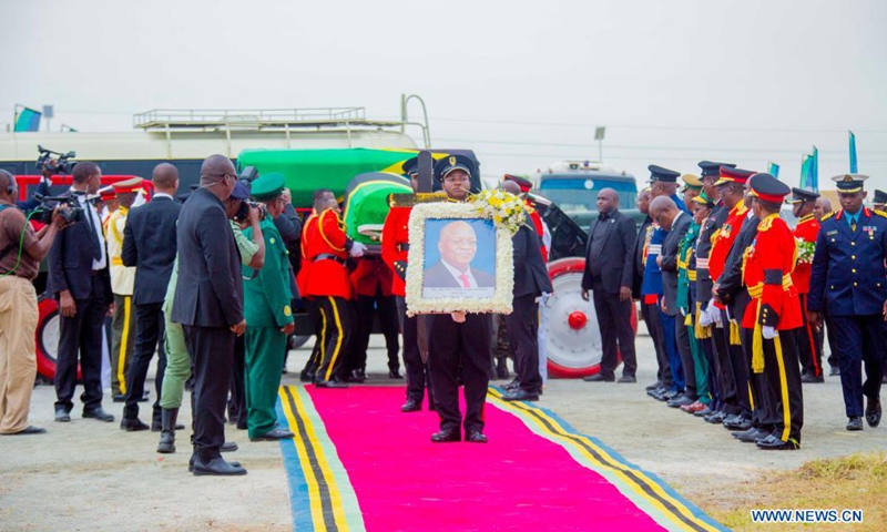 Soldiers carry the casket of former Tanzanian President John Magufuli in Chato, Tanzania, on March 26, 2021. Tanzania on Friday held a burial ceremony for former President Magufuli in his native town of Chato in Geita region with full military honors mounted by the Tanzania People's Defense Forces.Photo:Xinhua