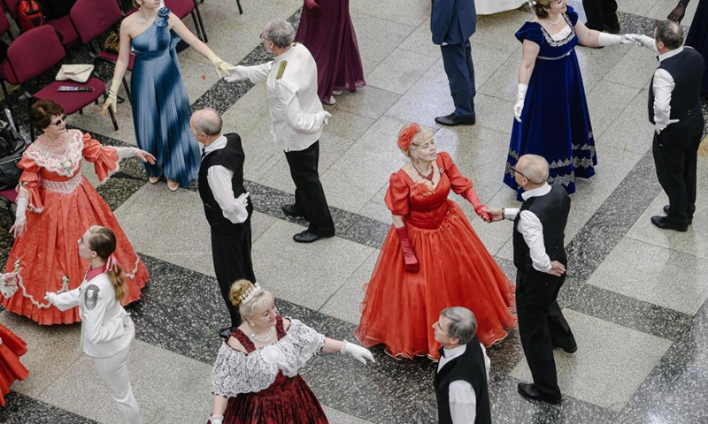 Participants dance at the Spring Ball in the Victory Museum in Moscow, Russia, on April 3, 2021. More than 200 participants from different cities of Russia gathered here to attend the traditional Spring Ball on Saturday. (Xinhua)