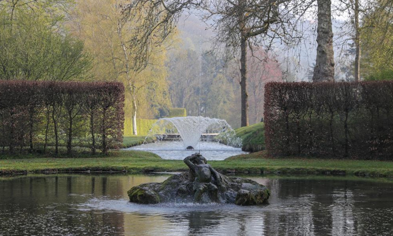 A pond and a fountain are seen in the Water Gardens of Annevoie in Annevoie-Rouillon, Namur, Belgium, May 1, 2021.    Photo: Xinhua