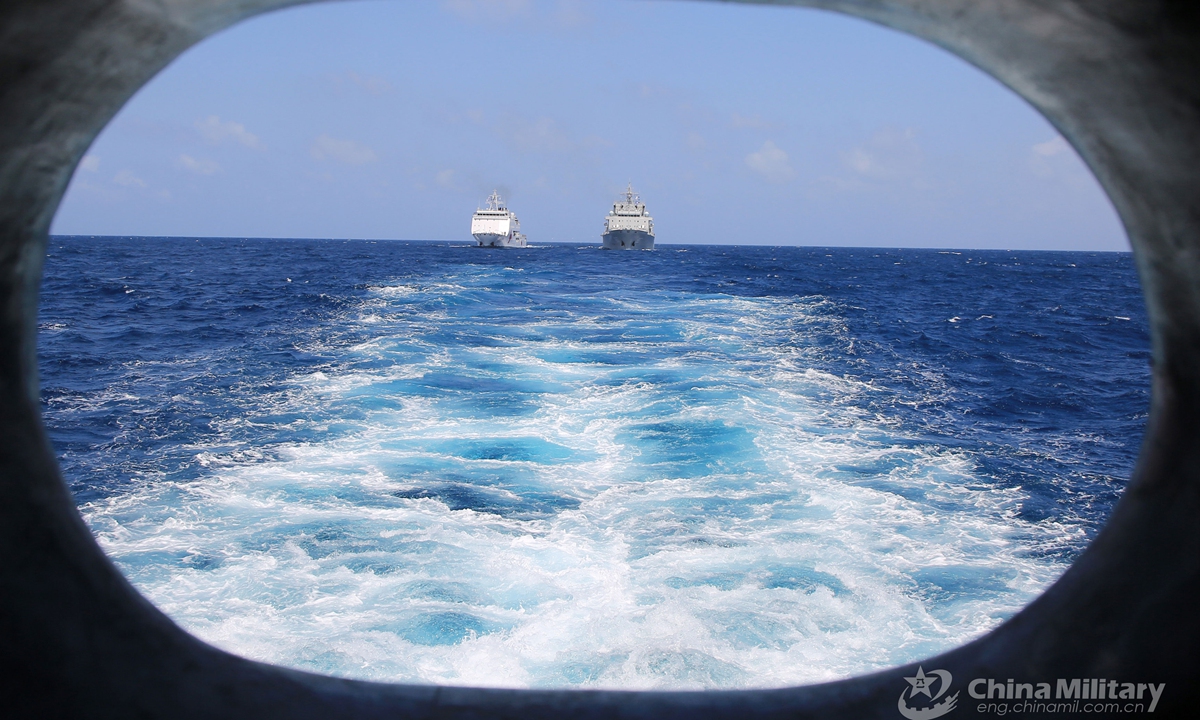 Naval vessels attached to an auxiliary ship group under the PLA Southern Theater Command perform alongside liquid cargo replenishment-at-sea during a maritime training exercise in mid- April, 2021.Photo: China Military Online