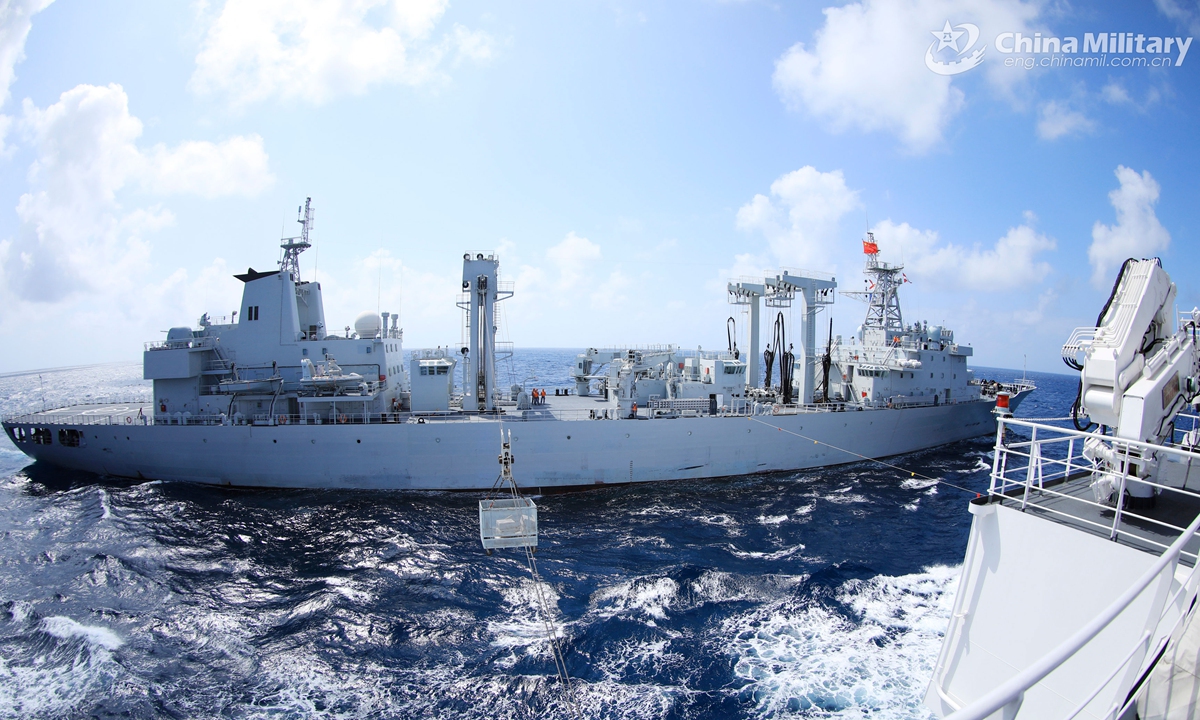 Naval vessels attached to an auxiliary ship group under the PLA Southern Theater Command perform alongside liquid cargo replenishment-at-sea during a maritime training exercise in mid- April, 2021.  Photo: China Military Online