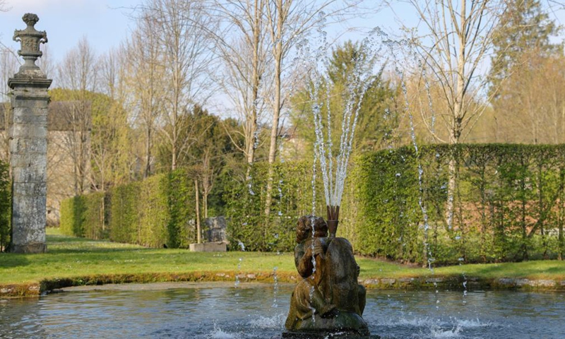 A pond and a fountain are seen in the Water Gardens of Annevoie in Annevoie-Rouillon, Namur, Belgium, May 1, 2021.   Photo: Xinhua
