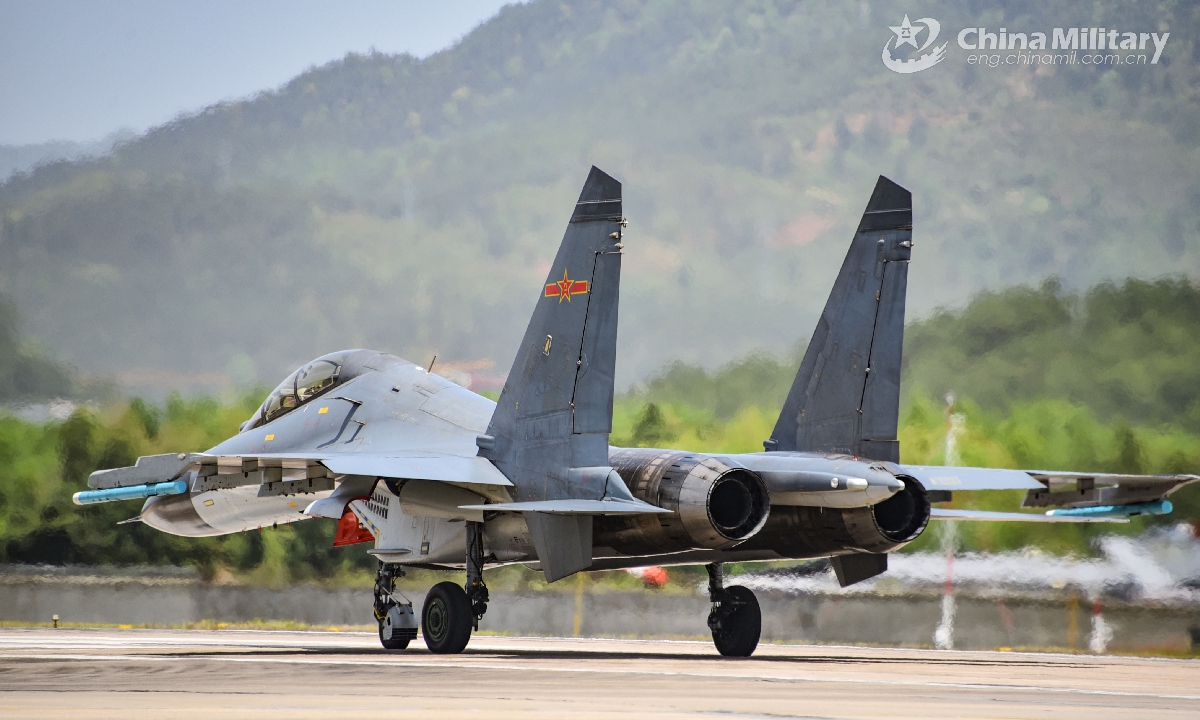 Fighter jet attached to a naval aviation brigade under the PLA Eastern Theater Command gets ready to take off for a flight training exercise on April 17, 2021. (eng.chinamil.com.cn/Photo by Fu Gan)