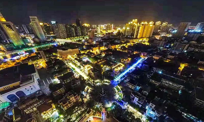 Aerial photo take on May 1, 2021 shows the night view of a highlighted Italian-style street in north China's Tianjin. (Photo by Sun Fanyue/Xinhua)