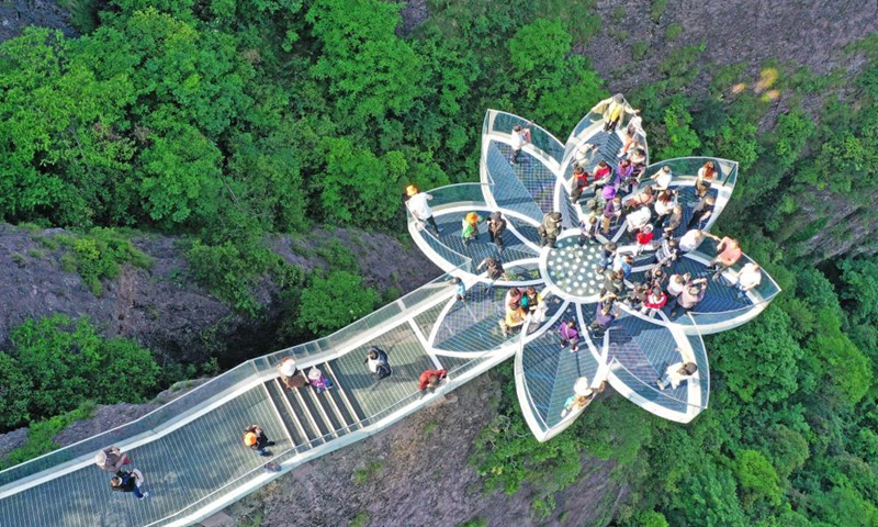 Aerial photo taken on May 2, 2021 shows visitors at Shenxianju scenic area in Taizhou, east China's Zhejiang Province. Sunday marks the second day of China's five-day May Day holiday. (Photo by Wang Huabin/Xinhua)