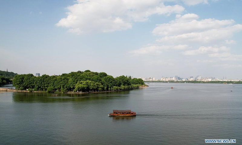HANGZHOU, CHINA - MAY 26, 2021 - An aerial view of a giant Louis Vuitton  bag by the West Lake in Hangzhou, capital of east China's Zhejiang  Province, May 26, 2021. Organizers