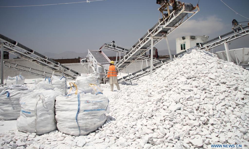 A man works at a talc stone processing factory in Sorkh Road district of Nangarhar province, Afghanistan, on May 9, 2021. Afghanistan has resumed the export of talc stone from a key mine in the country's eastern province of Nangarhar, the Ministry of Industry and Commerce said on Sunday.(Photo: Xinhua)