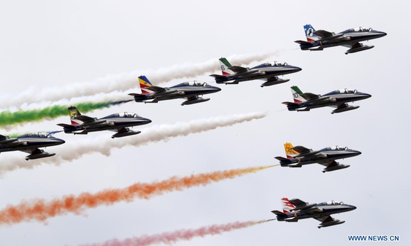 The Italian Frecce Tricolori aerobatic squad perform during a ceremony to mark Italy's National Day in Rome, Italy, on June 2, 2021. The Italian government formally scaled back celebrations of the country's national day, scrapping traditional military parades and public speeches. But Rome's streets were still filled with people venturing out amid newly eased coronavirus restrictions.(Photo: Xinhua)