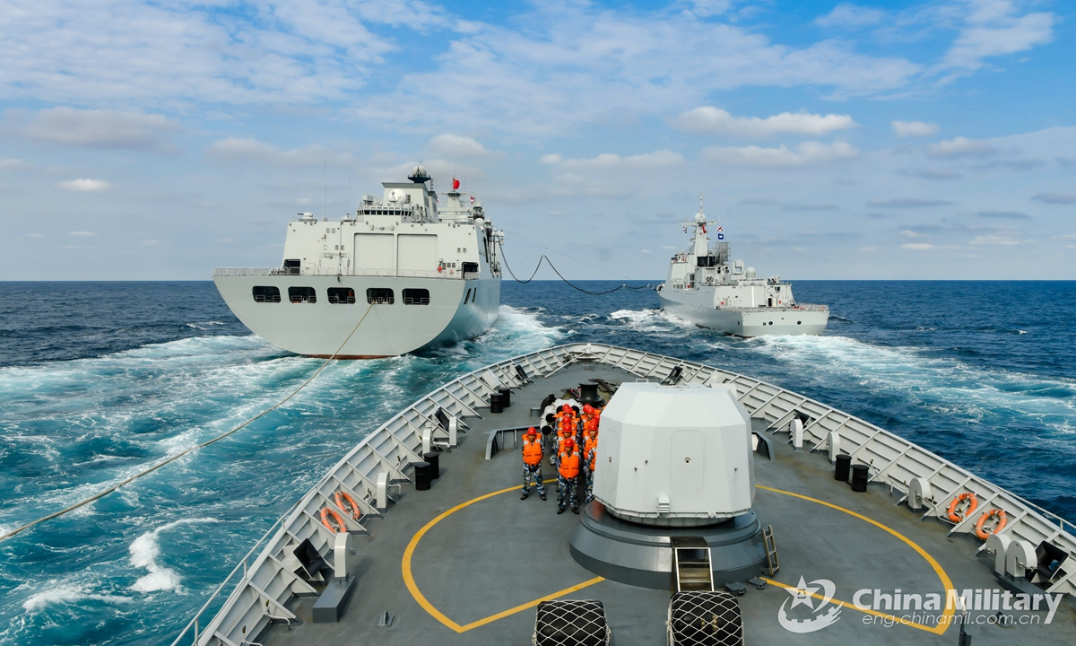 Warships attached to a destroyer flotilla with the navy under the PLA Southern Theater Command perform replenishment-at-sea during a four-day-long realistic-combat training exercise in waters of the South China Sea recently.Photo:China Military