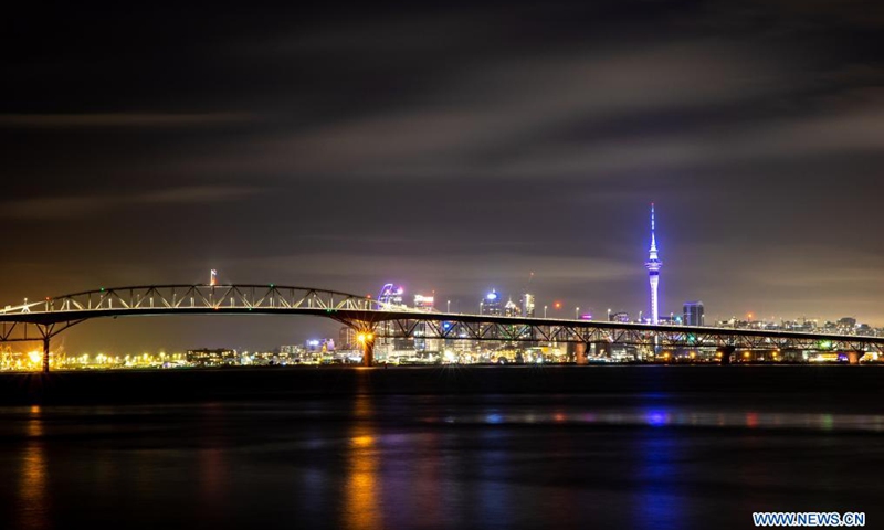 A light show is held to celebrate the beginning of Matariki (Maori New Year) in Auckland, New Zealand, June 19, 2021. Thousands of people turned out on Saturday night to watch Vector Lights bring Auckland's iconic Harbour Bridge to life to celebrate the beginning of Matariki (Maori New Year).Photo:Xinhua