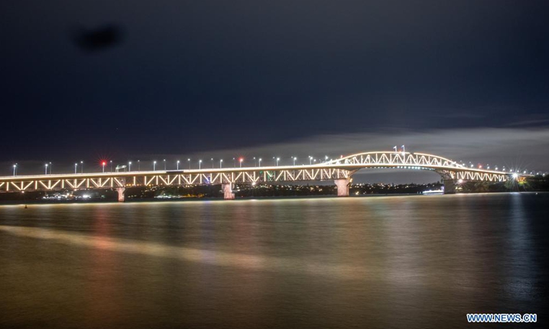 A light show is held to celebrate the beginning of Matariki (Maori New Year) in Auckland, New Zealand, June 19, 2021. Thousands of people turned out on Saturday night to watch Vector Lights bring Auckland's iconic Harbour Bridge to life to celebrate the beginning of Matariki (Maori New Year).Photo:Xinhua