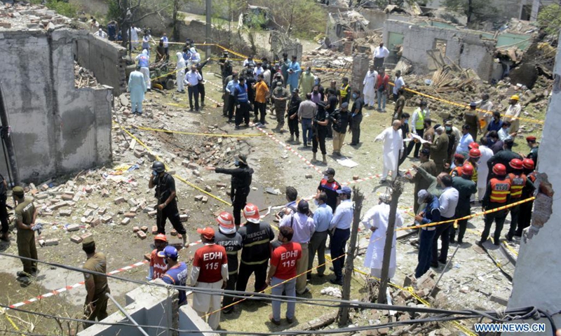 Security officials and rescuers work at the site of a blast in Lahore, Pakistan on June 23, 2021. A powerful explosion ripped through a residential area in Lahore, the capital city of Pakistan's eastern Punjab province, killing at least two people and injuring 15 others, an official said on Wednesday.(Photo: Xinhua)