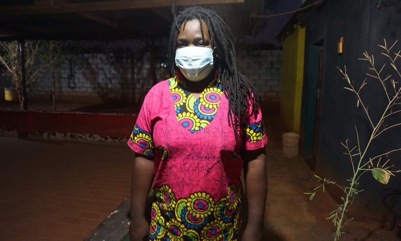 Zambian music artiste Daputsa Nkhata-Zulu poses for a photo after explaining the importance of wearing a face mask correctly in the Chibombo district, central Zambia, on July 3, 2021.(Photo: Xinhua)