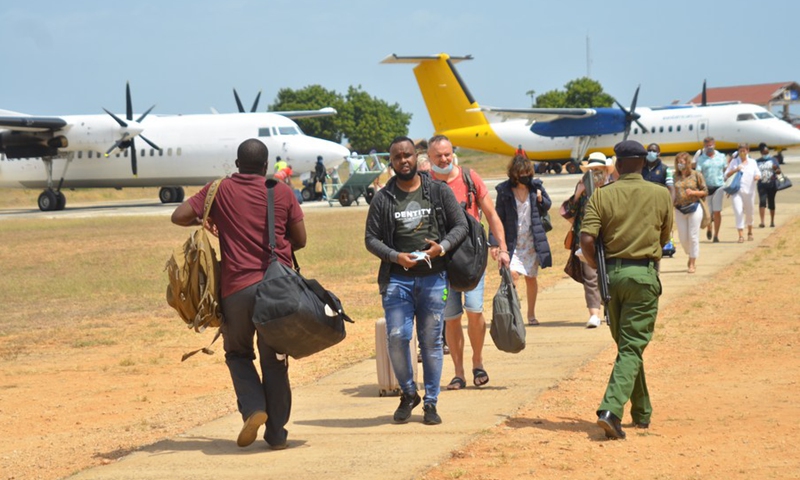 International and local tourists arrive for holiday at Manda Airport in Lamu County, Kenya, Jan. 12, 2021. (Photo: Xinhua)