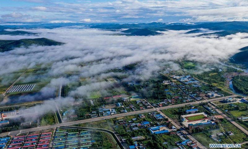 Aerial photo taken on Aug. 6, 2021 shows fog floating over Ali River Township of Oroqen Autonomous Banner of Hulun Buir, north China's Inner Mongolia Autonomous Region. Photo:Xinhua