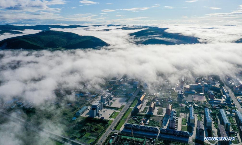 Aerial photo taken on Aug. 6, 2021 shows fog floating over Ali River Township of Oroqen Autonomous Banner of Hulun Buir, north China's Inner Mongolia Autonomous Region. Photo:Xinhua