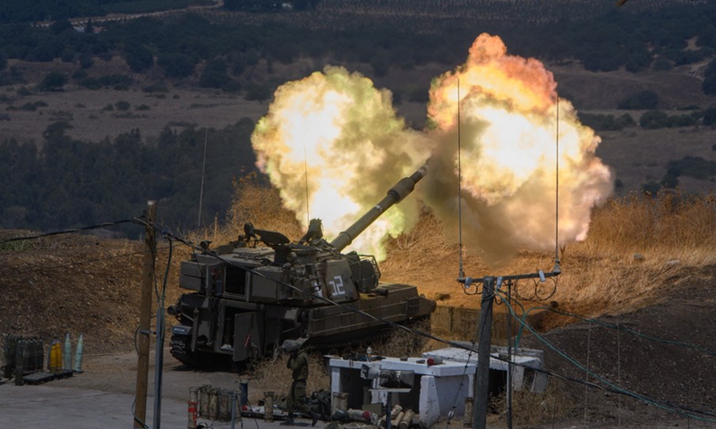 An Israeli artillery unit fires at targets in the Lebanese territory from the Israeli-occupied Golan Heights on Aug. 6, 2021.(Photo: Xinhua)