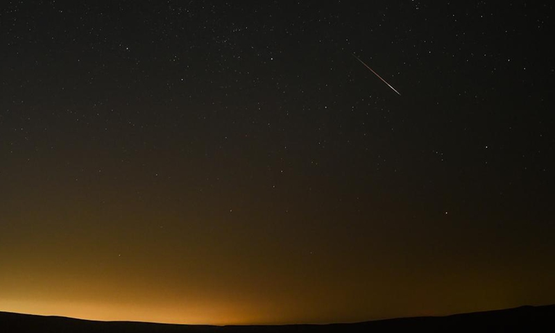 Photo taken on Aug. 13, 2021 shows the night sky during the Perseid Meteor Shower above an ecological demonstration zone of Engebei in Kubuqi Desert, north China's Inner Mongolia Autonomous Region.Photo:Xinhua