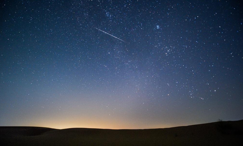 Photo taken on Aug. 13, 2021 shows the night sky during the Perseid Meteor Shower above an ecological demonstration zone of Engebei in Kubuqi Desert, north China's Inner Mongolia Autonomous Region.Photo:Xinhua