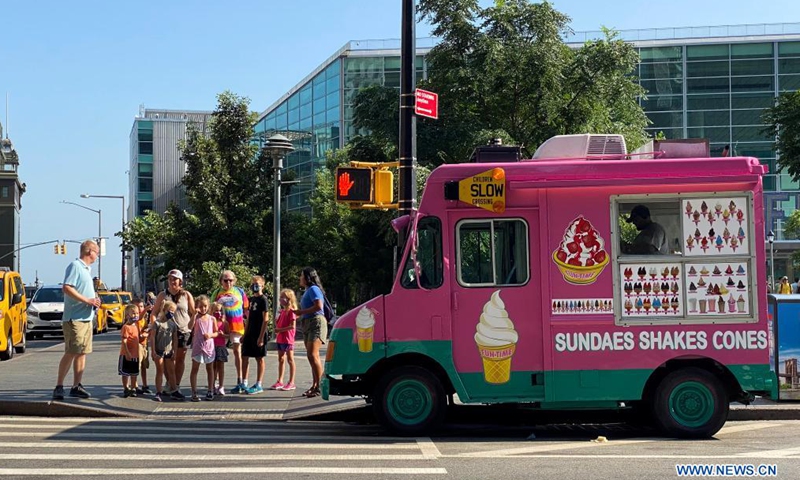 An ice-cream car is seen on the street in New York, the United States, Aug. 13, 2021. A heat wave recently hit New York City.Photo:Xinhua