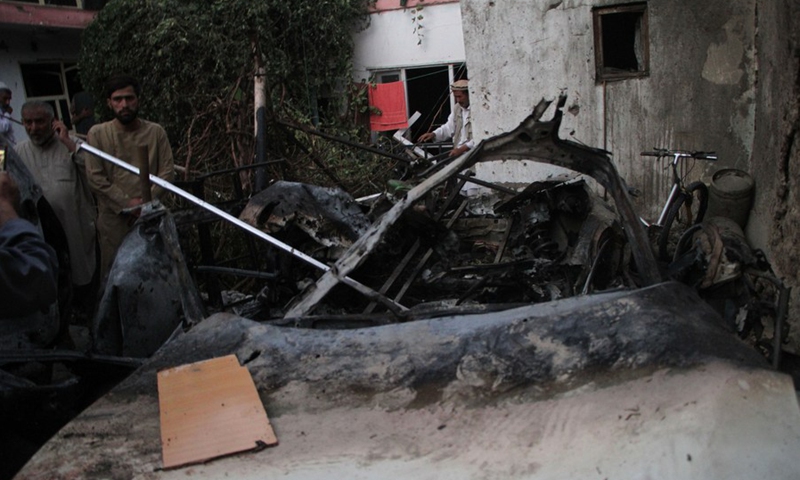 Photo taken on Aug. 29, 2021 shows a damaged vehicle at the site where a rocket struck in Kabul, capital of Afghanistan. (Photo: Xinhua)