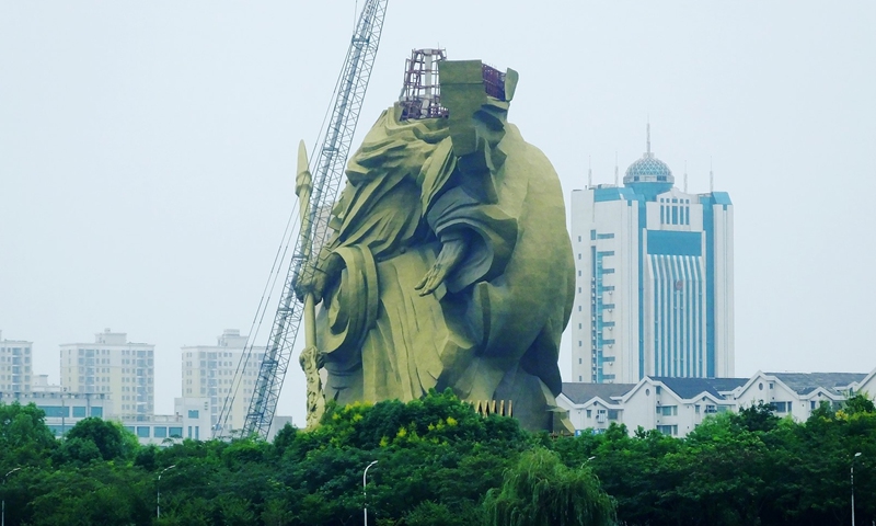 Relocation project of the controversial giant bronze statue of Guan Gong (or Guan Yu) in Jingzhou, Central China's Hubei Province, has been launched in September 2021. Photo: VCG