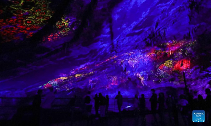 A sound and light show is seen at the Cave of Han in Han-sur-Lesse, Wallonia, Belgium, on Sept. 4, 2021. As an important tourist destination famous for its geological scenery in Wallonia, the Cave of Han has been visited by over 23 million tourists. (Photo: Xinhua)