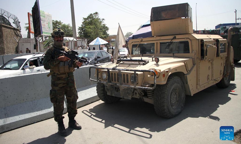 An Afghan Taliban member stands guard outside the airport in Kabul, capital of Afghanistan, Sept. 6, 2021. Afghanistan's flag carrier airline Ariana Afghan Airlines has resumed domestic flights, a local television channel reported Sunday.(Photo: Xinhua)