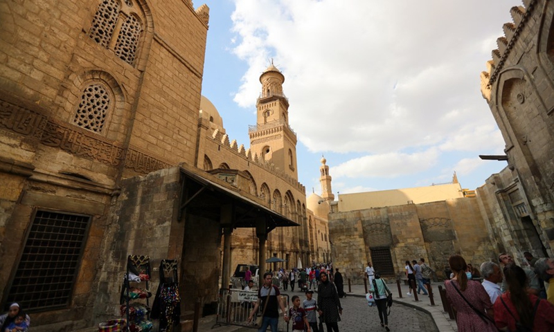 People wander on the Muizz Street, one of the oldest streets in Historic Cairo, Egypt, on Sept. 11, 2021.(Photo: Xinhua)