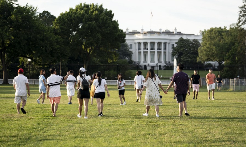 People wander near the White House in Washington, D.C., the United States, June 22, 2021.(Photo: Xinhua)