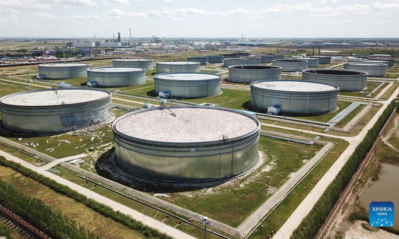 Aerial photo taken on May 26, 2021 shows oil storage tanks at Daqing Oilfield in Daqing, northeast China's Heilongjiang Province. China's Daqing Oilfield announced on Aug. 25 the discovery of a major shale oil field with predicted geological reserves of about 1.27 billion tonnes. Discovered in 1959, Daqing Oilfield has made a significant contribution to China's modern petroleum industry system. It also steps up efforts to improve its ecological environment in recent years.(Photo: Xinhua)