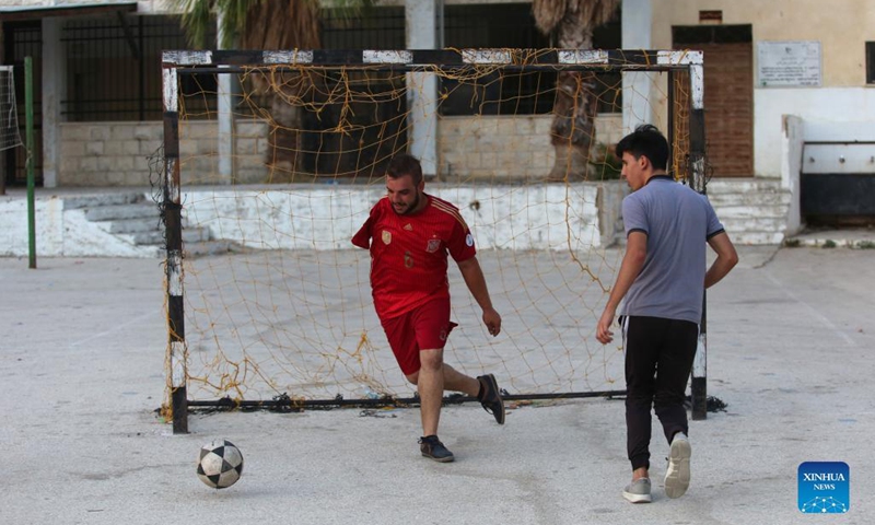 Oday Nasser trains at a small stadium in Deir Sharaf village in the West Bank city of Nablus, on Sept. 15, 2021. Without an arm, Oday Nasser has become an outstanding goalkeeper known across the West Bank, who managed to win dozens of medals in the local football league.(Photo: Xinhua)