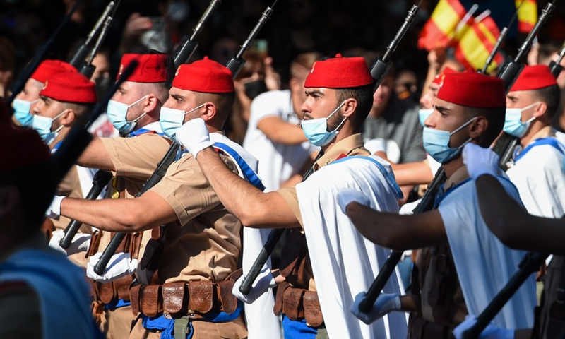 Soldiers attend a parade to celebrate the National Day of Spain in Madrid, Spain, Oct. 12, 2021. (Photo: Xinhua)