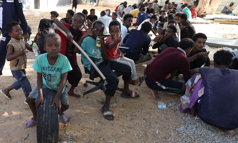 Migrants are temporarily settled in the Ain Zara shelter in Tripoli, Libya, on Oct. 11, 2021.(Photo: Xinhua)