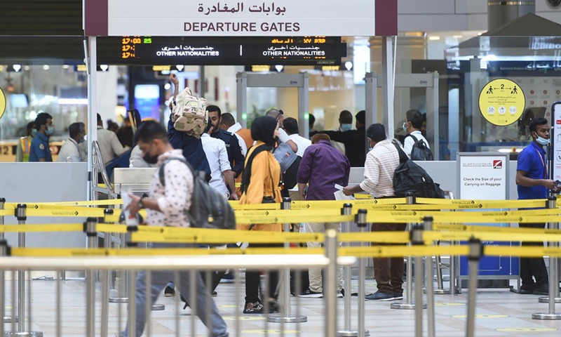 Passengers enter the departure hall of Kuwait International Airport in Farwaniya Governorate, Kuwait, Oct. 24, 2021.(Photo: Xinhua)