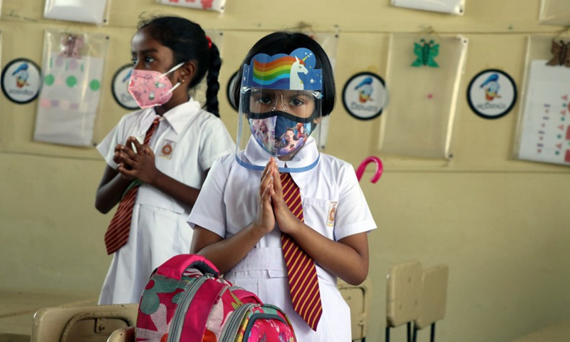 Students wearing face masks are seen at a primary school in Colombo, Sri Lanka, Oct. 25, 2021.(Photo: Xinhua)