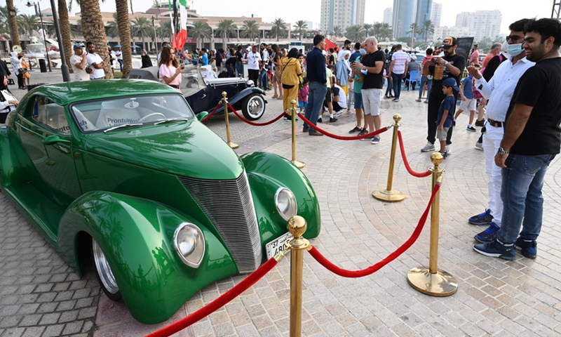 People visit a classic car show in Hawalli Governorate, Kuwait, on Oct. 29, 2021.(Photo: Xinhua)