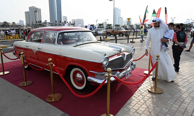 People visit a classic car show in Hawalli Governorate, Kuwait, on Oct. 29, 2021.(Photo: Xinhua)