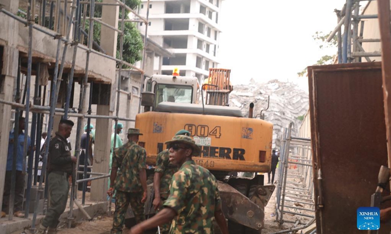 Rescuers work at the site of a building collapse in Lagos, Nigeria, on Nov. 1, 2021. At least four people were killed after a 21-storey building under construction collapsed Monday afternoon in the city of Lagos, Nigeria's economic hub, an emergency management official said.(Photo: Xinhua)